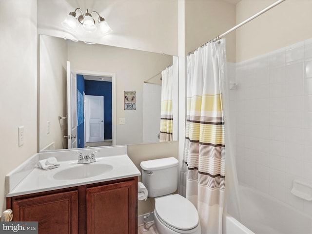 full bathroom with shower / bath combination with curtain, vanity, and toilet