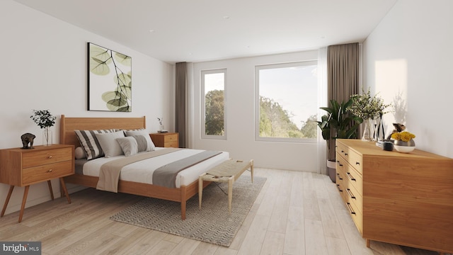 bedroom with light hardwood / wood-style floors