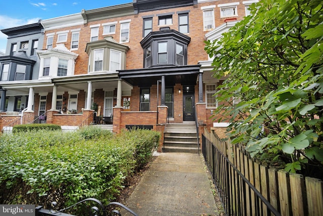 view of property with covered porch