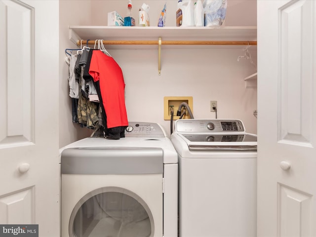 laundry area with washer and clothes dryer