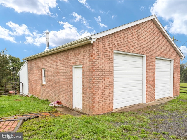 garage with a lawn