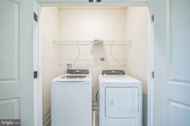 laundry area featuring separate washer and dryer