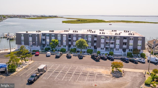 view of building exterior with a water view