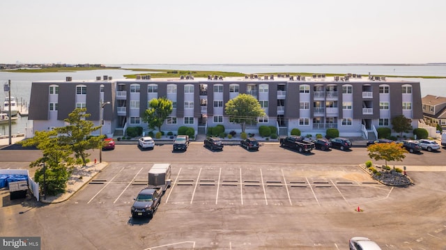 view of building exterior featuring a water view