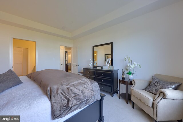 bedroom featuring light colored carpet