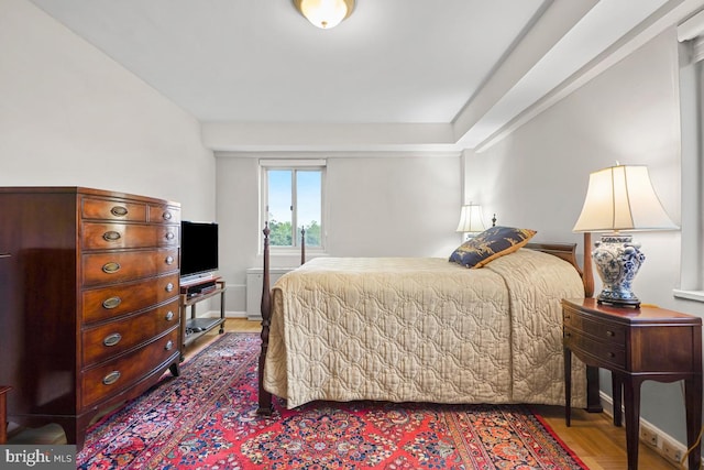 bedroom featuring hardwood / wood-style flooring