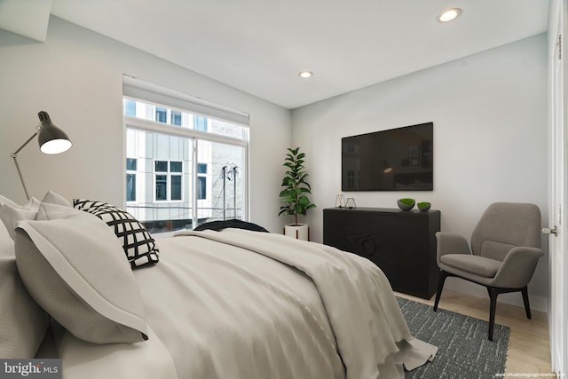 bedroom featuring hardwood / wood-style flooring