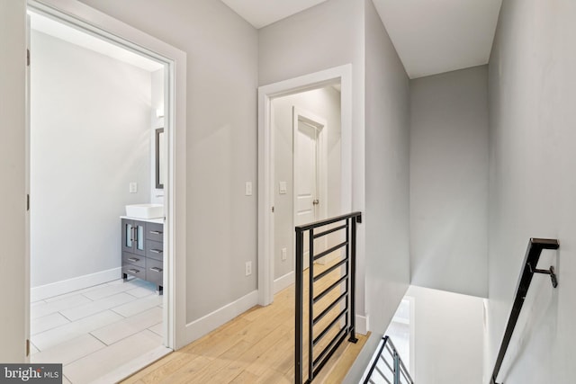 hallway with light wood-type flooring