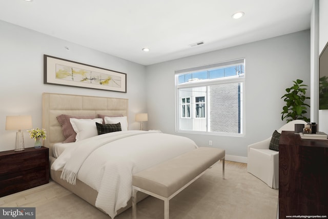 bedroom featuring light hardwood / wood-style floors