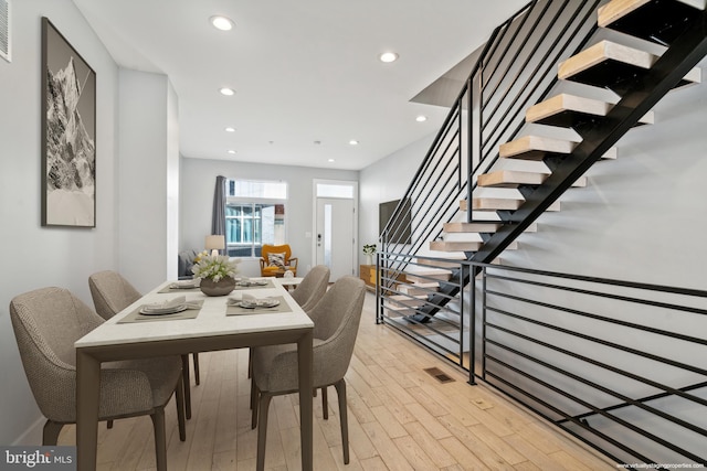 dining area with light wood-type flooring