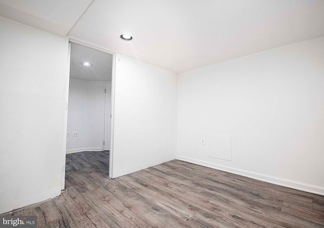 empty room with wood-type flooring