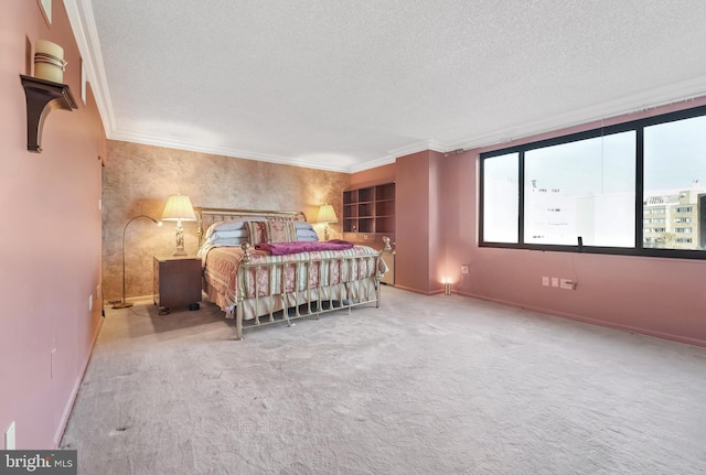 carpeted bedroom featuring crown molding and a textured ceiling