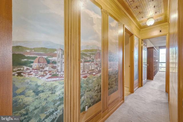 hall featuring wooden ceiling and carpet