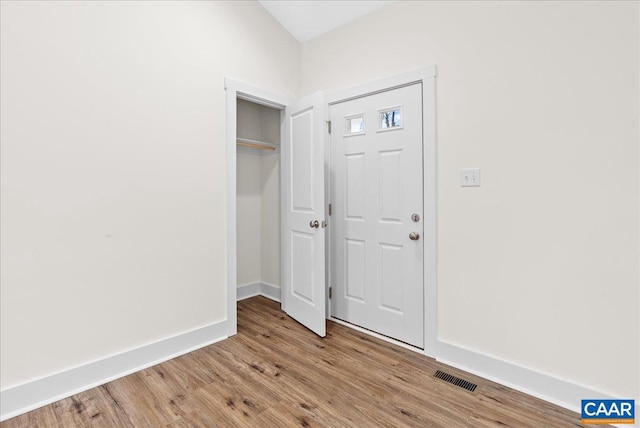 entrance foyer featuring light hardwood / wood-style floors