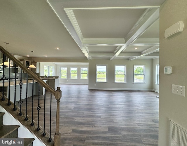 interior space featuring beamed ceiling, dark hardwood / wood-style floors, sink, coffered ceiling, and ornamental molding