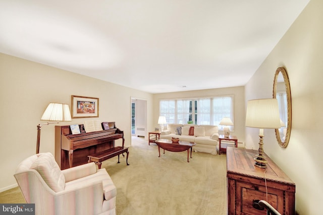living area with light carpet
