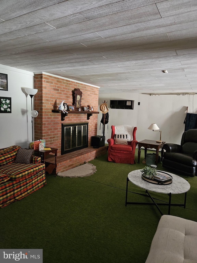 living room featuring a brick fireplace and carpet