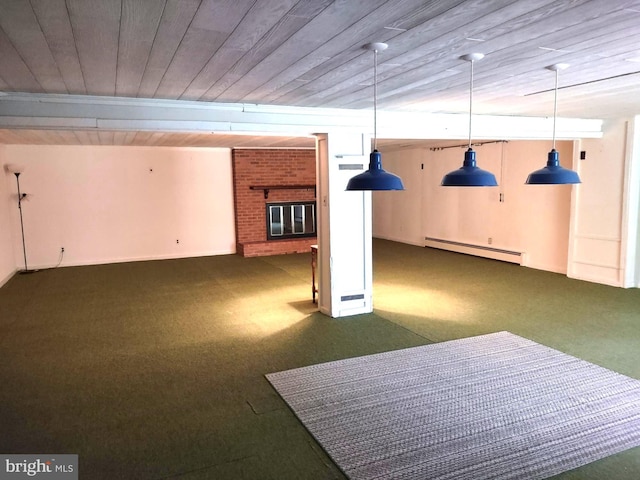 basement with a baseboard radiator, carpet floors, wooden ceiling, and a fireplace