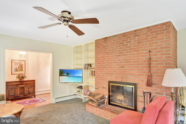 living room featuring a baseboard heating unit, ceiling fan, built in features, and a fireplace