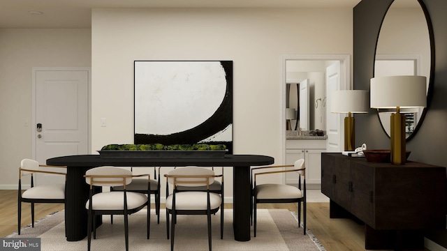 dining space featuring light hardwood / wood-style flooring