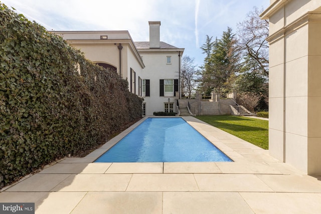 view of pool with a patio