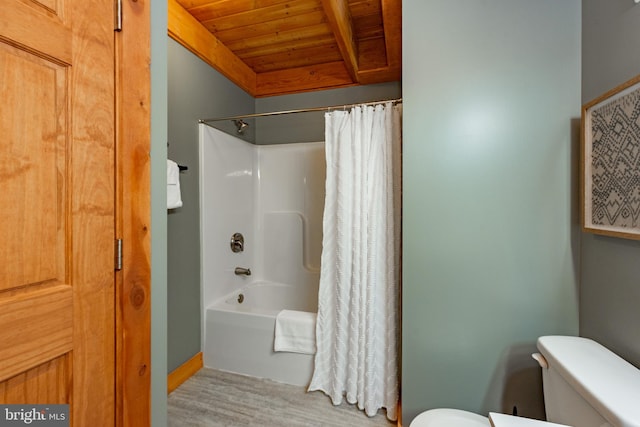 bathroom featuring wooden ceiling, shower / bath combo, hardwood / wood-style floors, and toilet