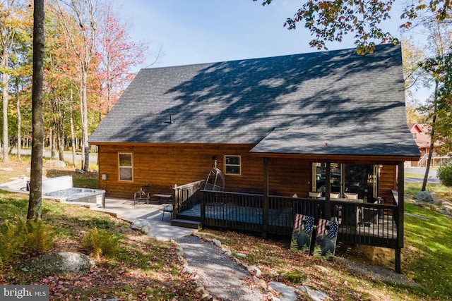 exterior space featuring a deck and a patio