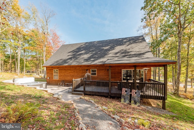 cabin featuring a wooden deck