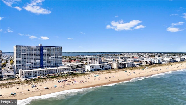 aerial view featuring a beach view and a water view