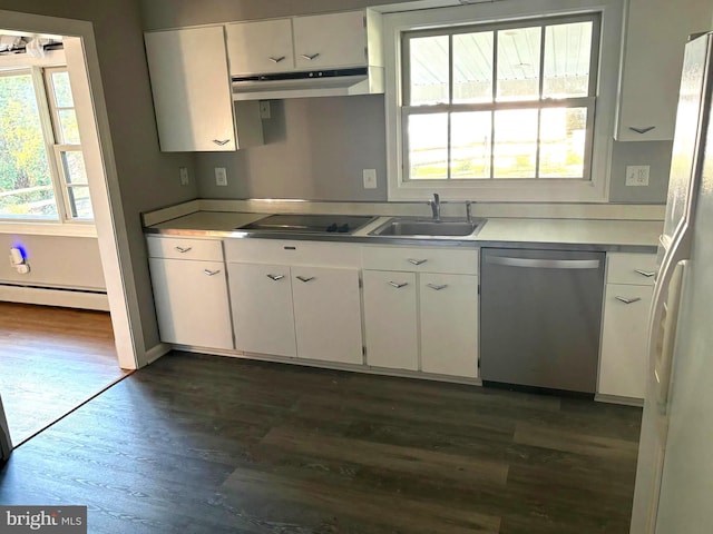 kitchen featuring sink, stainless steel dishwasher, a baseboard radiator, white cabinets, and black stovetop