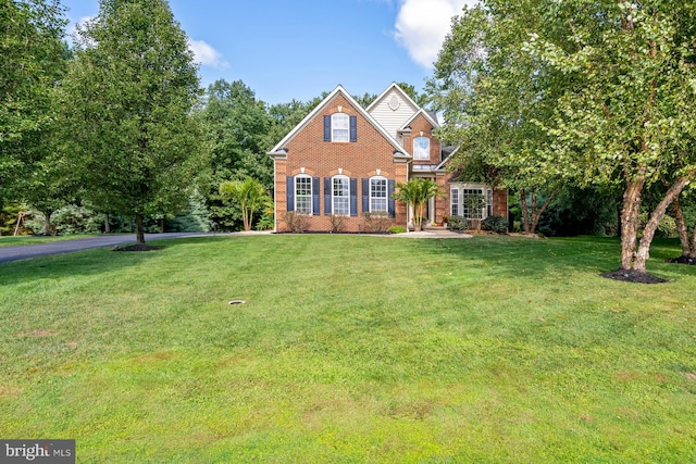 view of front of home featuring a front yard