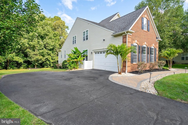 view of property exterior with a garage