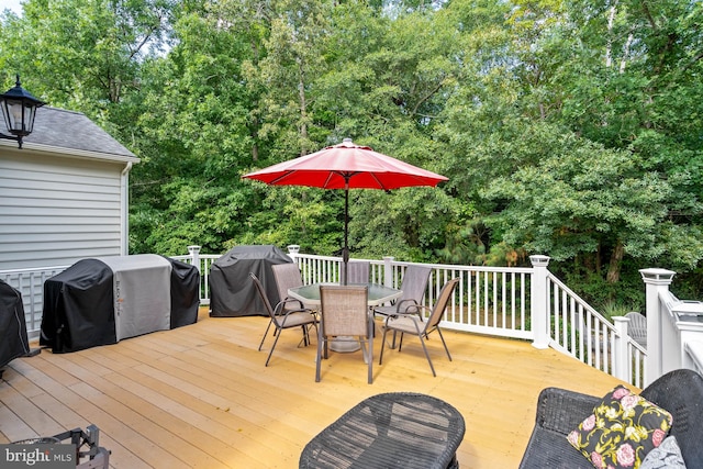 wooden terrace with grilling area