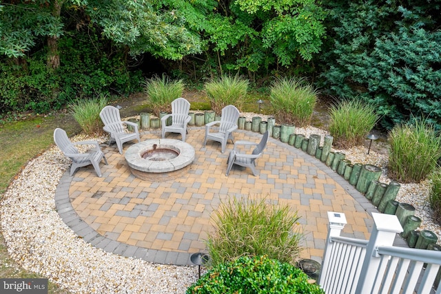 view of patio with an outdoor fire pit