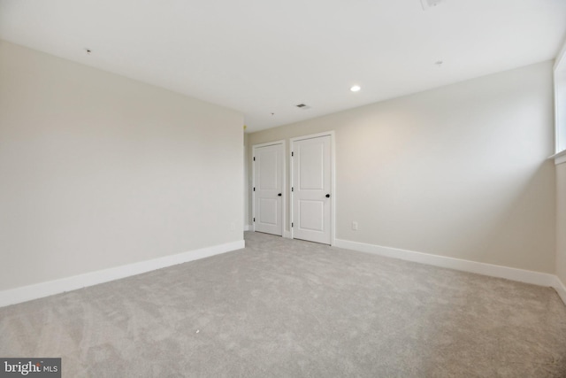 view of carpeted spare room