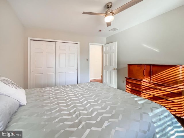 bedroom featuring a closet and ceiling fan