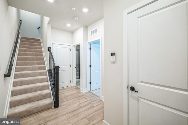 interior space with hardwood / wood-style floors