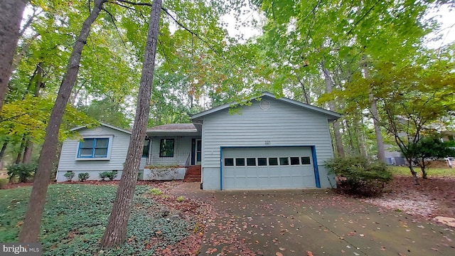 single story home featuring a garage