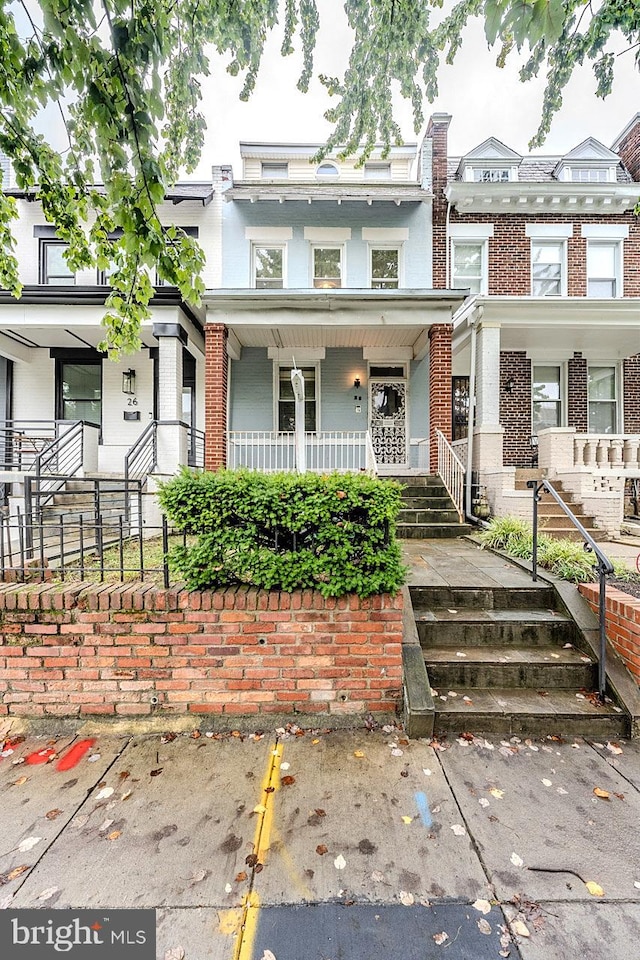 view of property with a porch