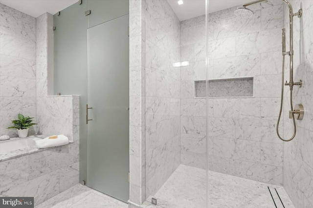 bathroom featuring walk in shower