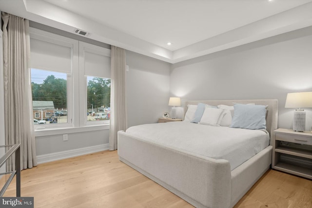 bedroom featuring light hardwood / wood-style floors