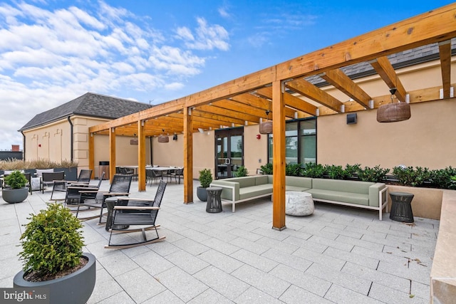 view of patio / terrace featuring a pergola and an outdoor living space