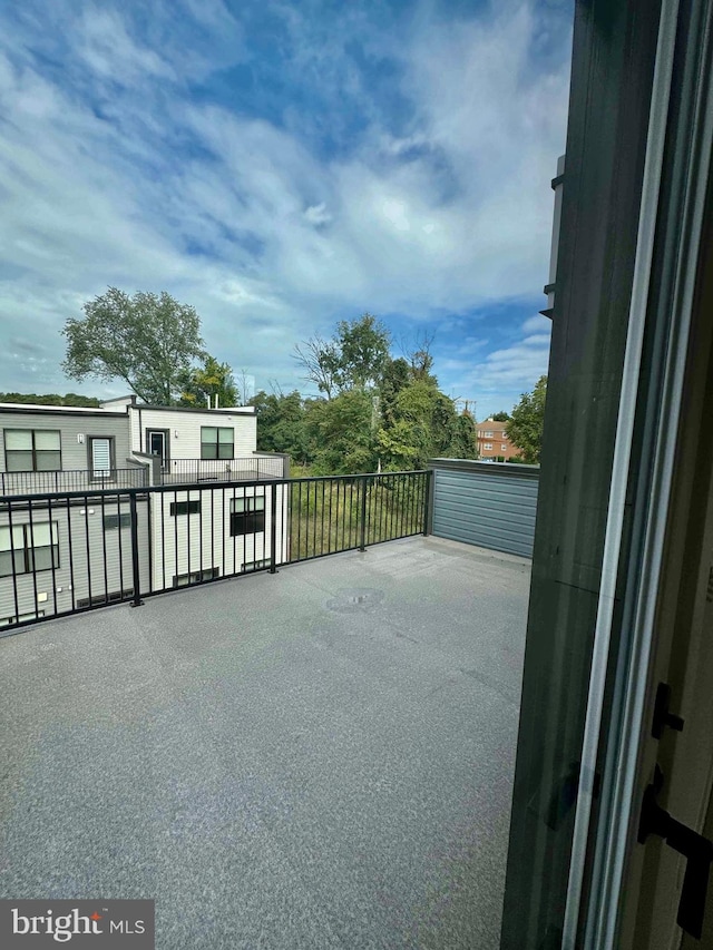 view of patio / terrace with a balcony