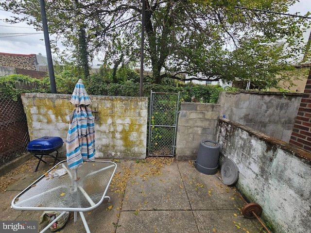 view of patio with a grill