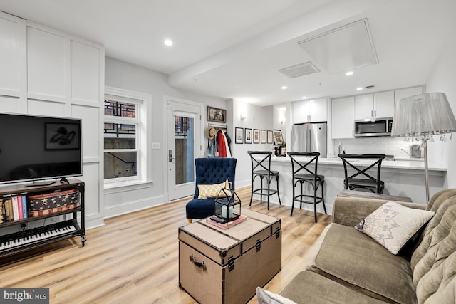 living room featuring light hardwood / wood-style floors