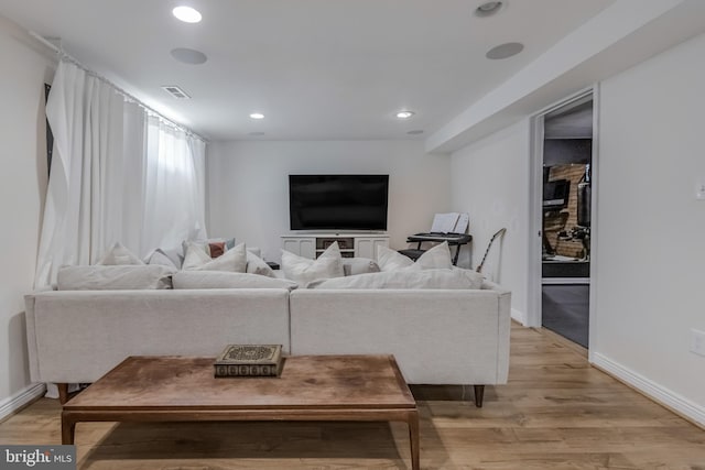 living room featuring light wood-type flooring