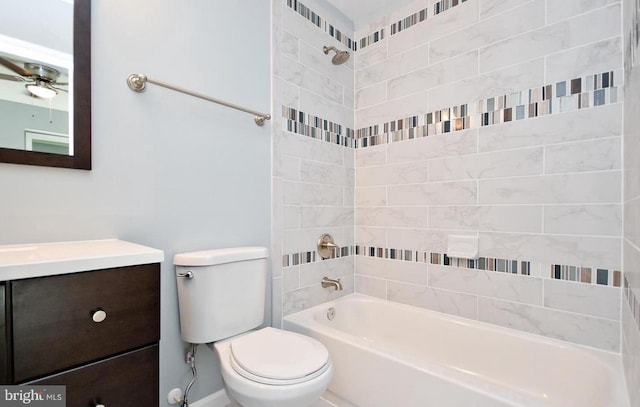 full bathroom with vanity, toilet, ceiling fan, and tiled shower / bath combo