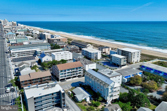 aerial view with a view of the beach and a water view