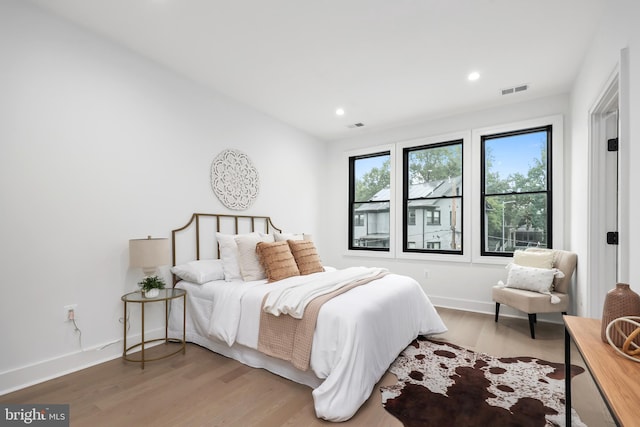 bedroom featuring hardwood / wood-style floors