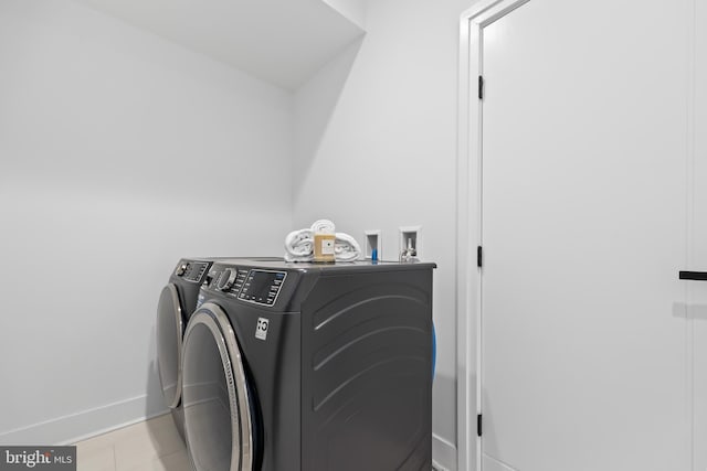 laundry area featuring washer and clothes dryer